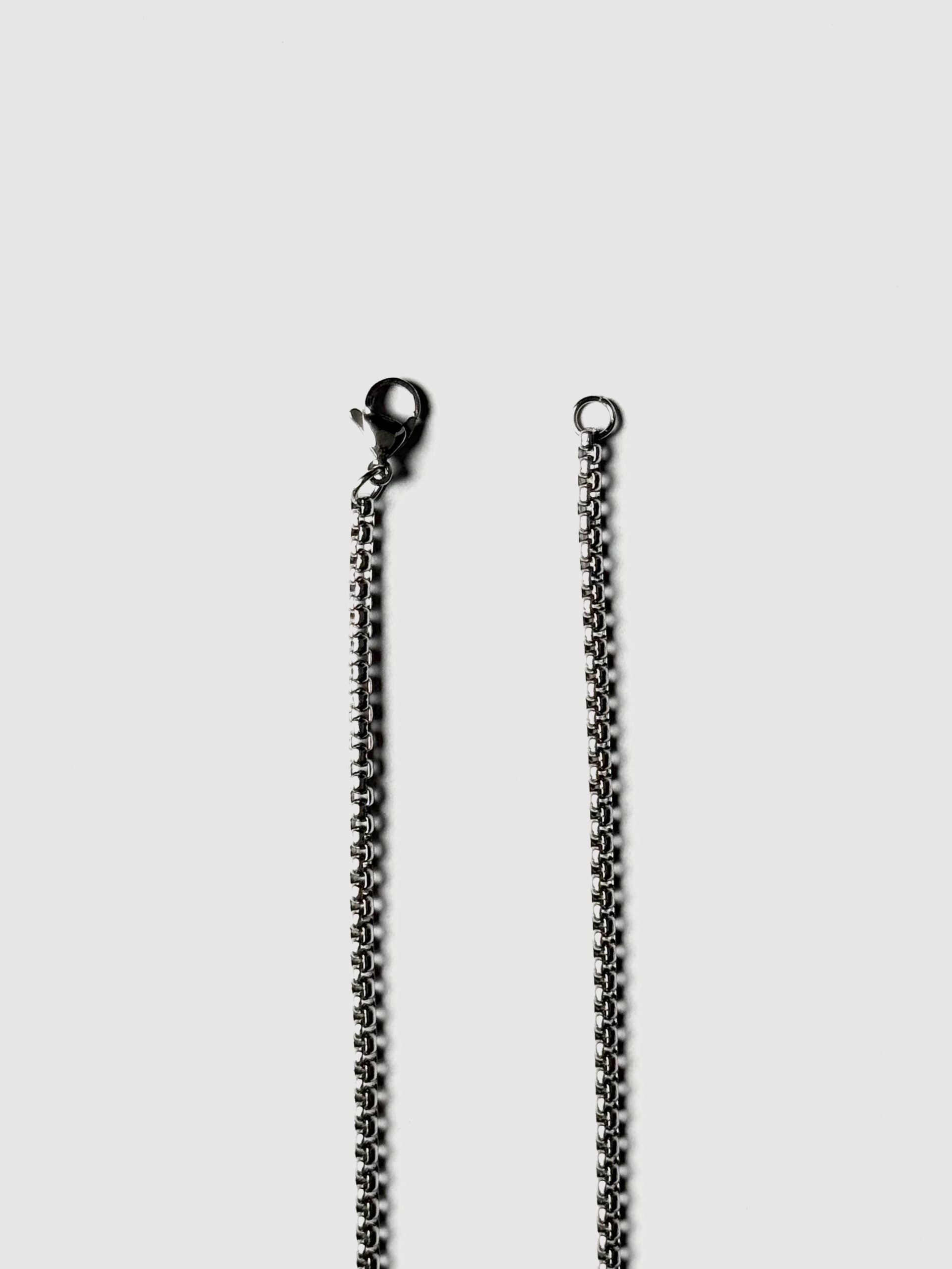 RAW CROSS CHAIN